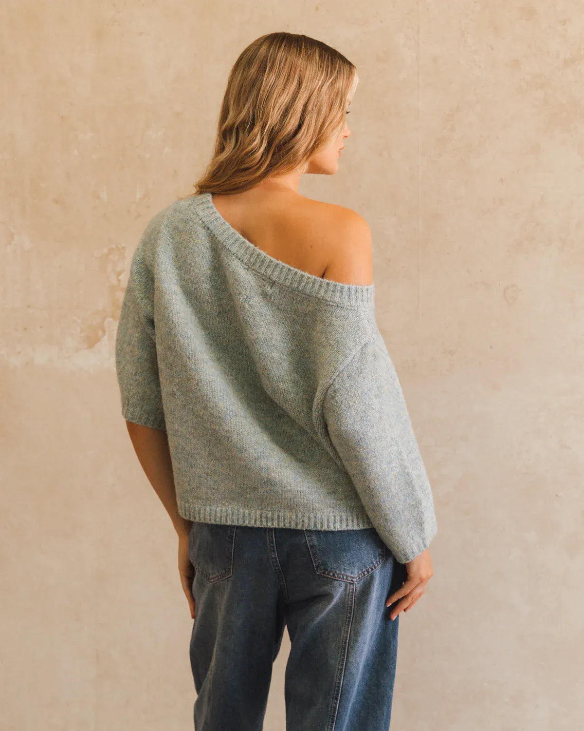 White Closet Shirts & Tops Asymmetrical Knit